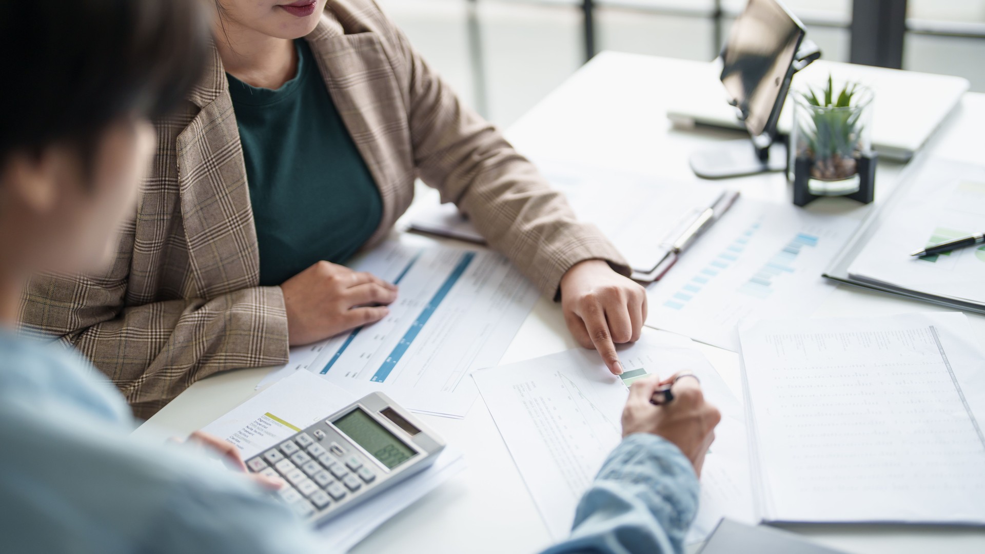 business man Auditor or internal revenue service staff checking annual financial statements company Audit Â Accounting tax.